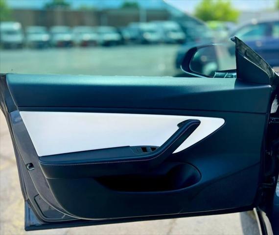 used 2018 Tesla Model 3 car, priced at $17,980