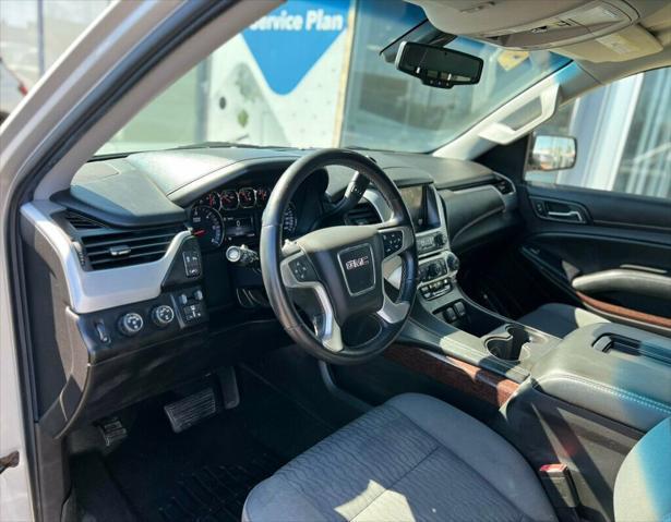 used 2015 GMC Yukon car, priced at $13,780