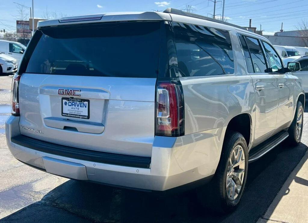 used 2015 GMC Yukon car, priced at $13,780