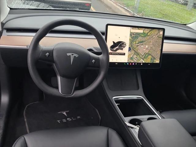 used 2023 Tesla Model 3 car, priced at $26,980