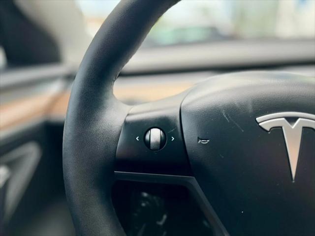 used 2023 Tesla Model 3 car, priced at $26,980