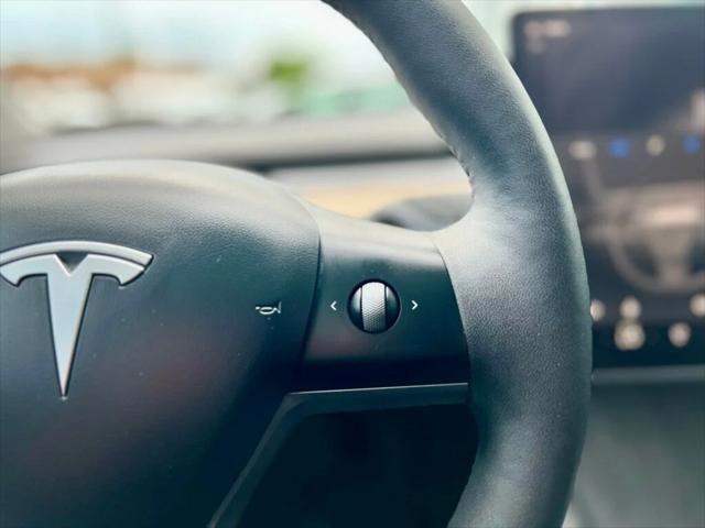 used 2023 Tesla Model 3 car, priced at $26,980