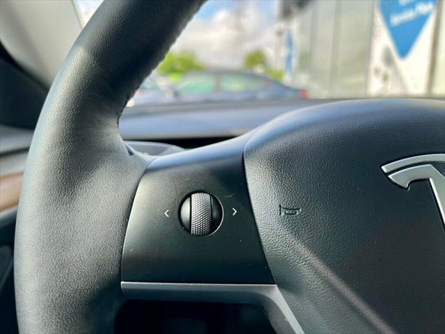 used 2022 Tesla Model 3 car, priced at $20,980