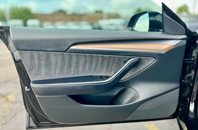 used 2022 Tesla Model 3 car, priced at $20,980