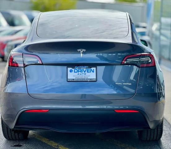 used 2023 Tesla Model Y car, priced at $31,780