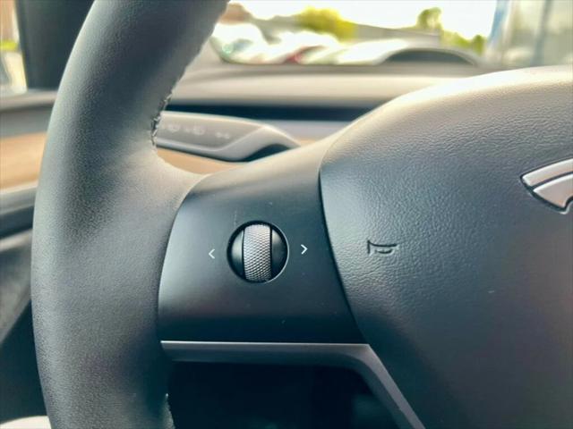 used 2023 Tesla Model Y car, priced at $31,780