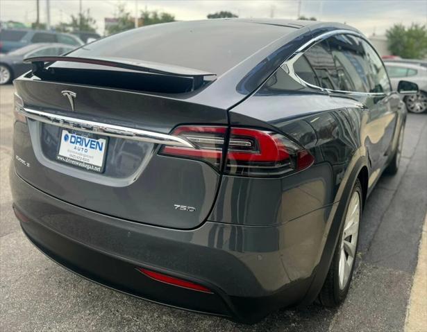 used 2018 Tesla Model X car, priced at $27,980