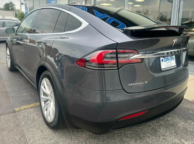 used 2018 Tesla Model X car, priced at $27,980