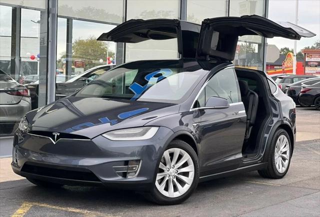 used 2018 Tesla Model X car, priced at $27,980