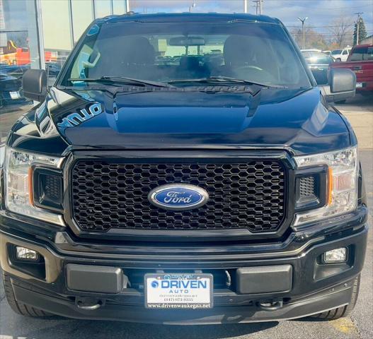 used 2018 Ford F-150 car, priced at $27,980