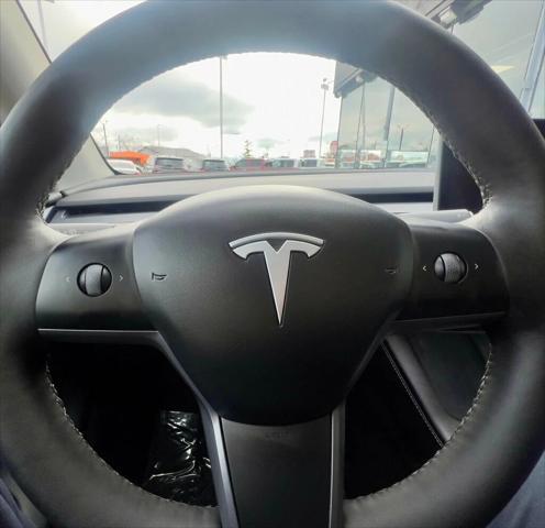 used 2023 Tesla Model Y car, priced at $32,980