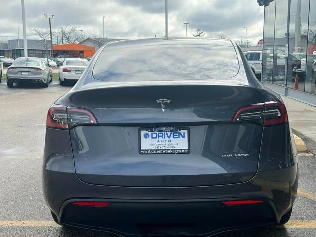 used 2023 Tesla Model Y car, priced at $32,980