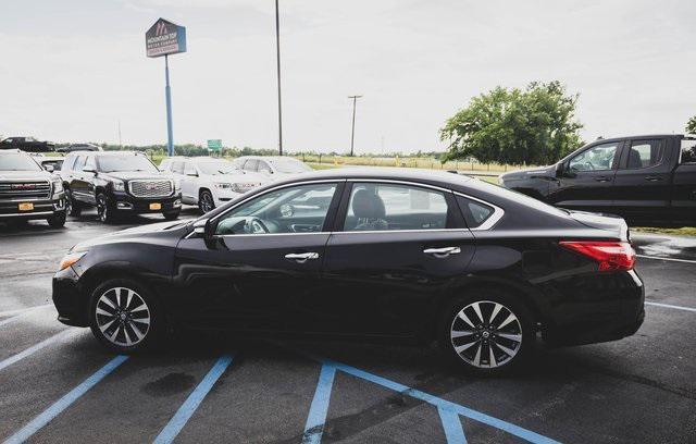 used 2016 Nissan Altima car, priced at $15,000