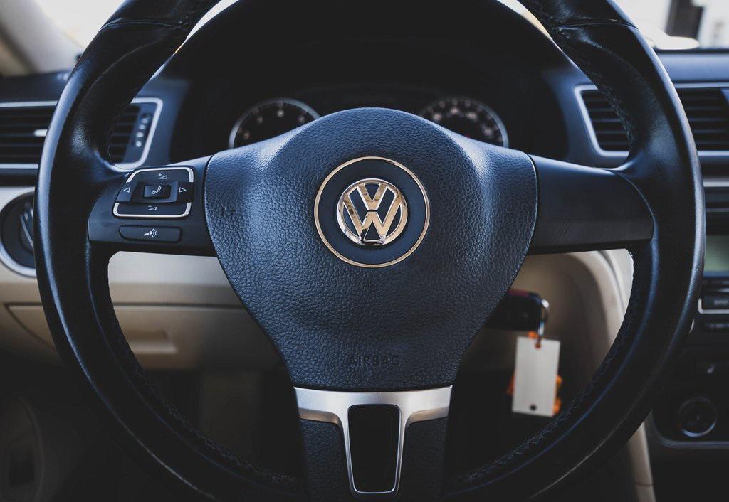 used 2015 Volkswagen Passat car, priced at $11,000