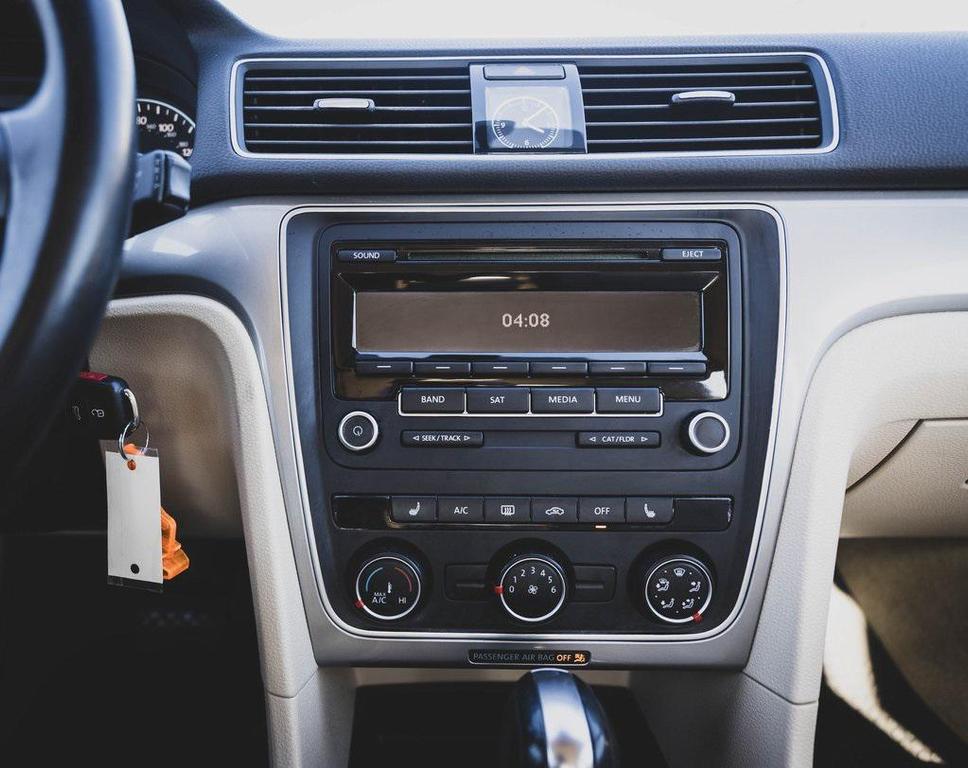 used 2015 Volkswagen Passat car, priced at $11,000