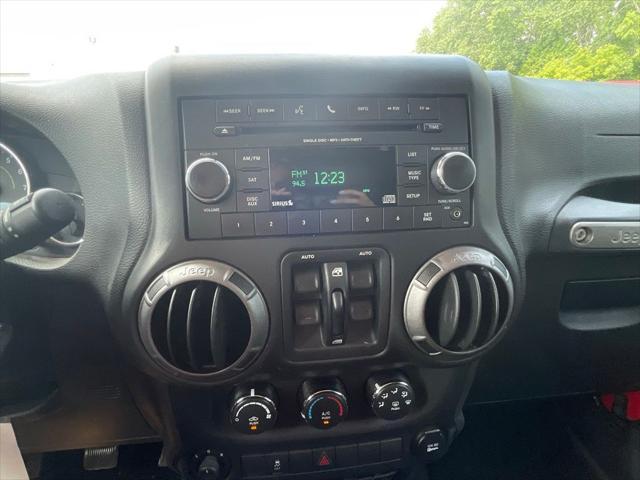 used 2015 Jeep Wrangler Unlimited car, priced at $15,453