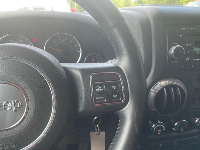 used 2015 Jeep Wrangler Unlimited car, priced at $15,453