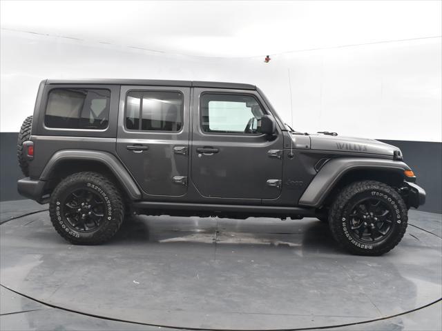 used 2021 Jeep Wrangler Unlimited car, priced at $33,660