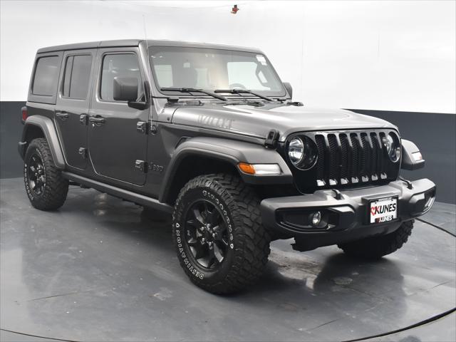 used 2021 Jeep Wrangler Unlimited car, priced at $33,660