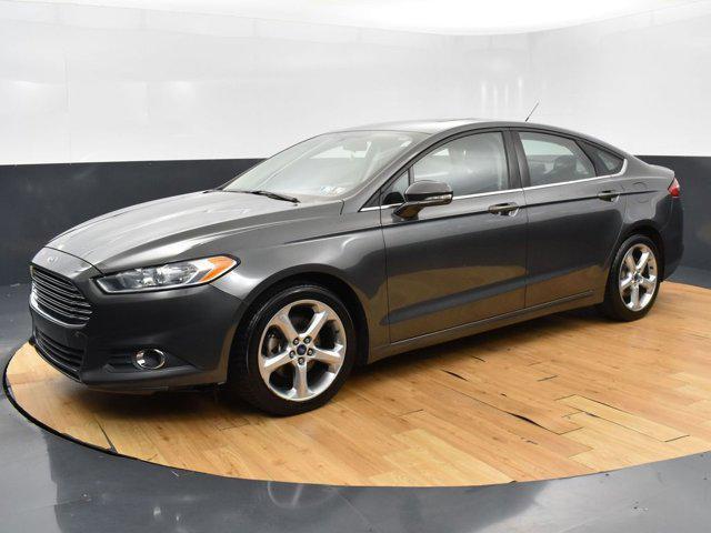 used 2015 Ford Fusion car, priced at $9,999