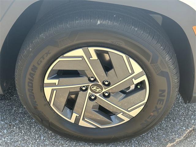 new 2025 Hyundai TUCSON Hybrid car, priced at $31,580