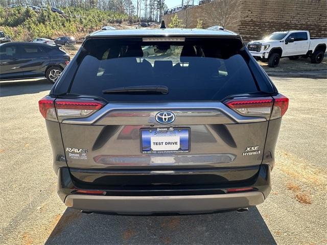 used 2019 Toyota RAV4 Hybrid car, priced at $30,704