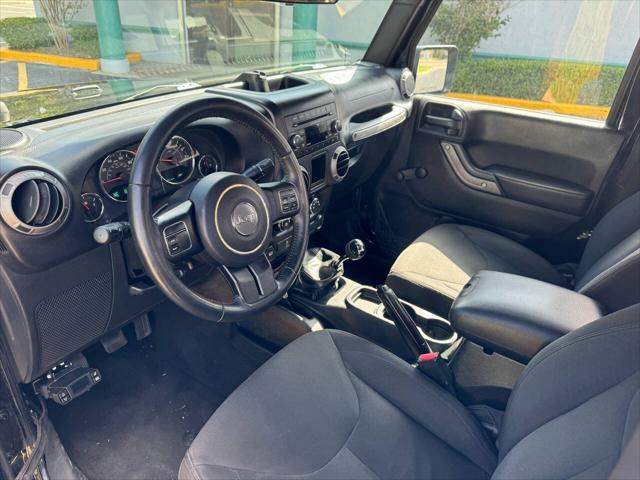 used 2016 Jeep Wrangler car, priced at $9,990