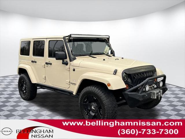 used 2011 Jeep Wrangler Unlimited car, priced at $14,499