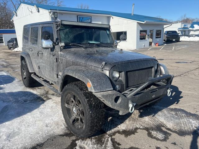 used 2014 Jeep Wrangler Unlimited car, priced at $15,037