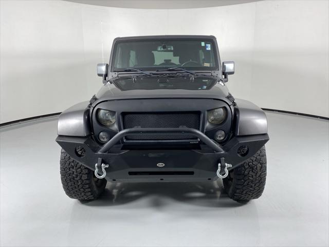 used 2014 Jeep Wrangler Unlimited car, priced at $15,510