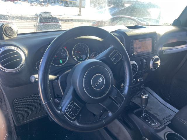 used 2014 Jeep Wrangler Unlimited car, priced at $15,037