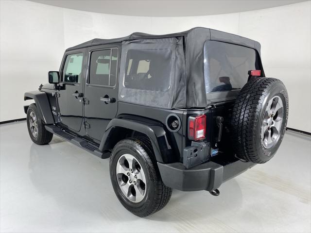 used 2016 Jeep Wrangler Unlimited car, priced at $17,525