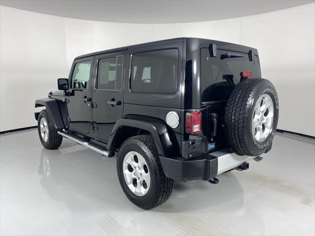 used 2015 Jeep Wrangler Unlimited car, priced at $18,188