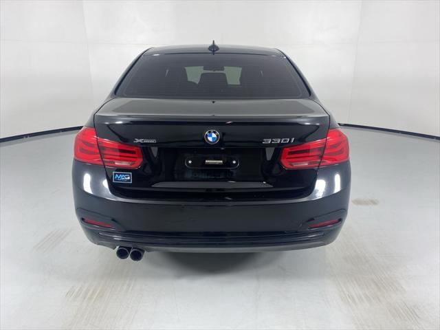 used 2018 BMW 330 car, priced at $12,097