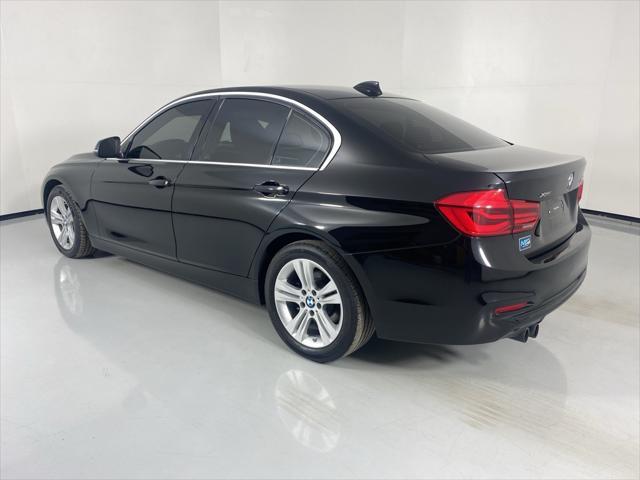 used 2018 BMW 330 car, priced at $12,097