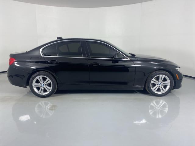 used 2018 BMW 330 car, priced at $12,097