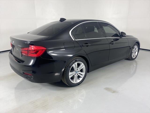 used 2018 BMW 330 car, priced at $12,097