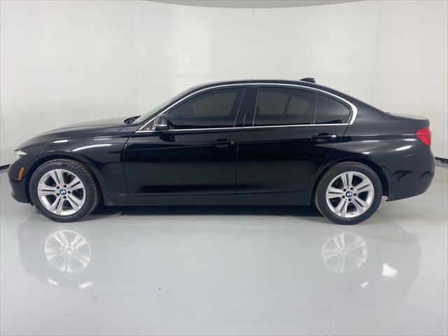 used 2018 BMW 330 car, priced at $12,097