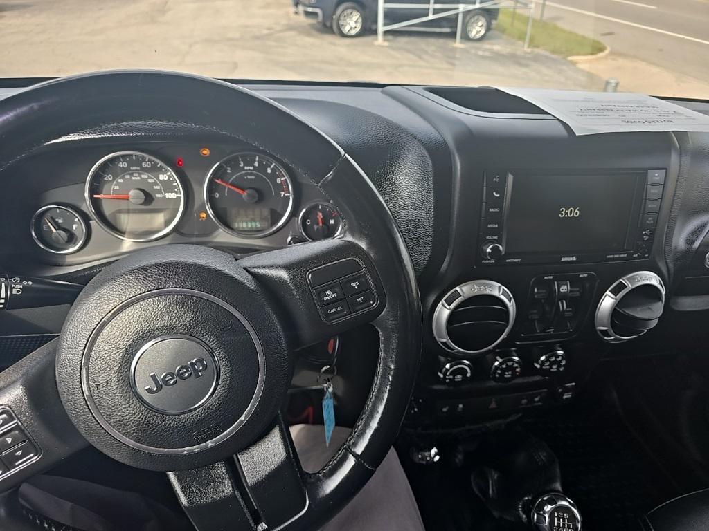 used 2013 Jeep Wrangler Unlimited car, priced at $13,096