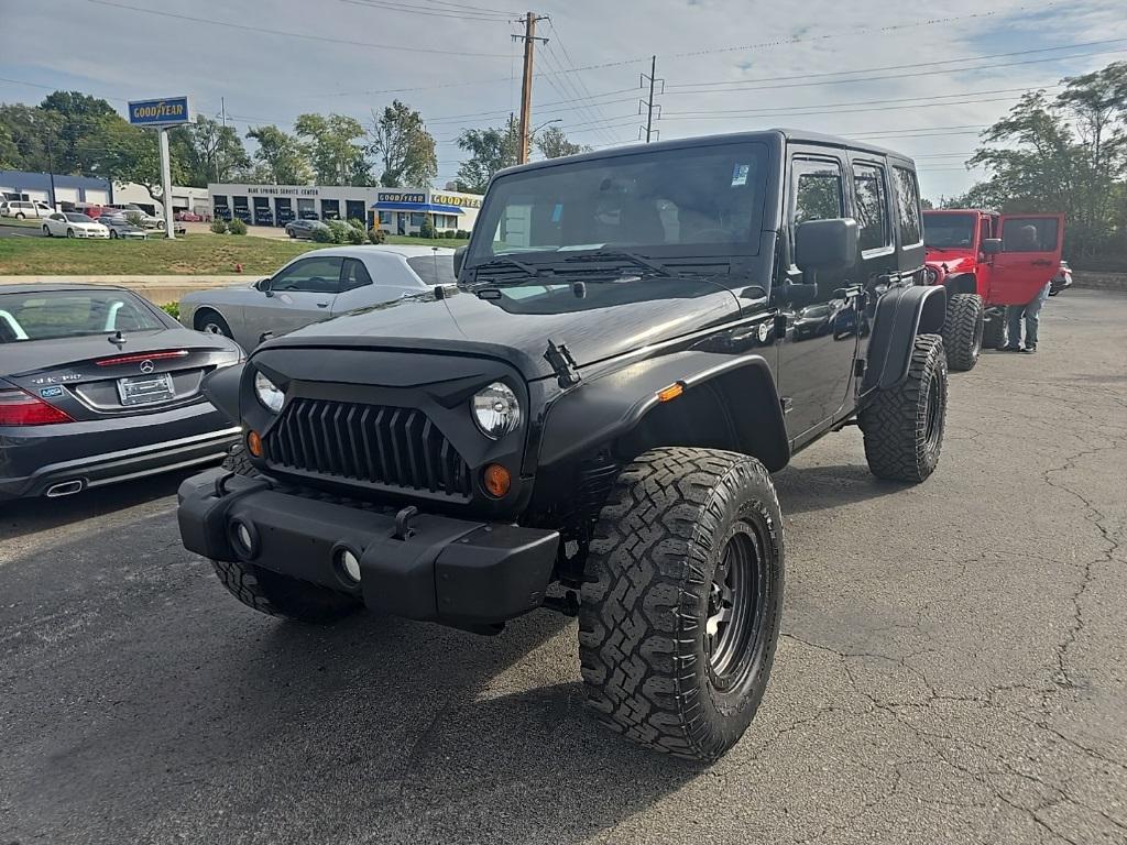 used 2013 Jeep Wrangler Unlimited car, priced at $13,096
