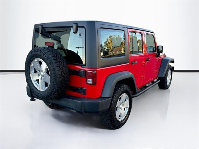 used 2015 Jeep Wrangler Unlimited car, priced at $16,885