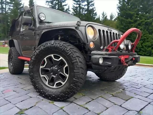 used 2014 Jeep Wrangler car, priced at $13,995