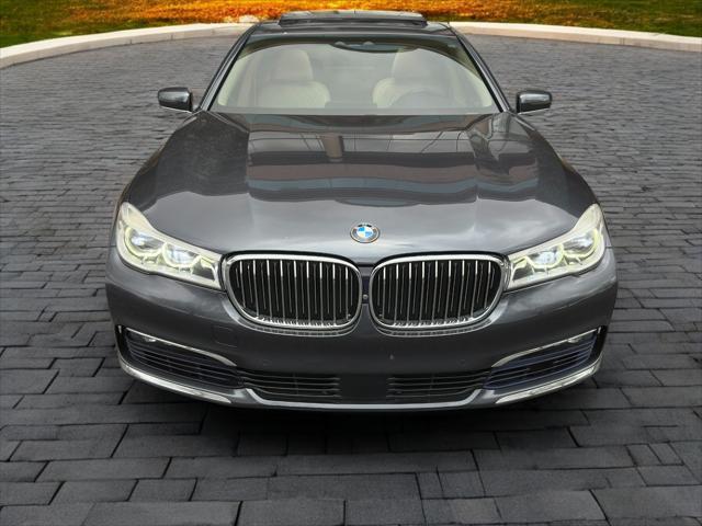 used 2016 BMW 750 car, priced at $16,788