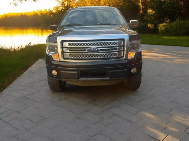 used 2014 Ford F-150 car, priced at $11,999