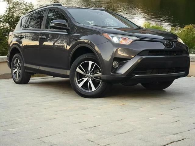 used 2018 Toyota RAV4 car, priced at $20,995