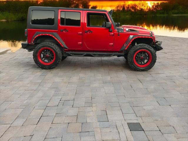 used 2016 Jeep Wrangler Unlimited car, priced at $21,595