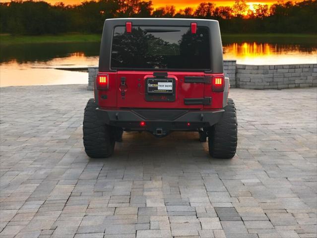 used 2016 Jeep Wrangler Unlimited car, priced at $21,595