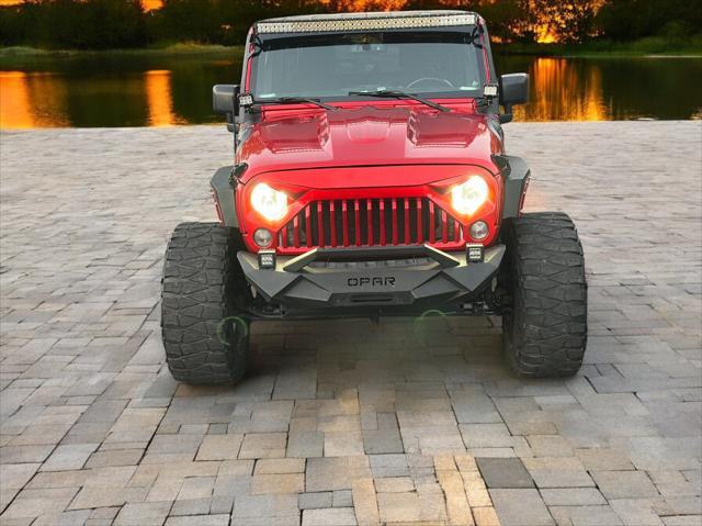 used 2016 Jeep Wrangler Unlimited car, priced at $21,595