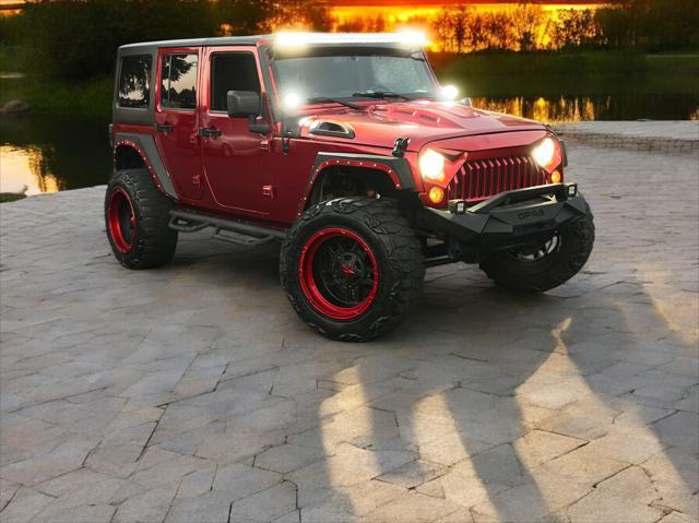 used 2016 Jeep Wrangler Unlimited car, priced at $21,595