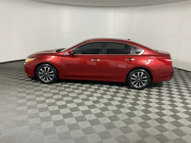 used 2017 Nissan Altima car, priced at $14,000